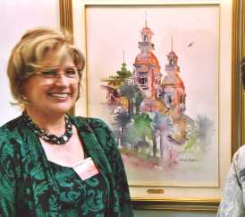 Lucia and one of her paintings: Monte-Carlo The Casino facing the sea